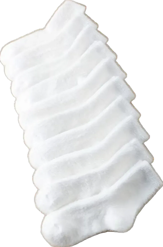 Set of six white ankle socks stacked on a white background